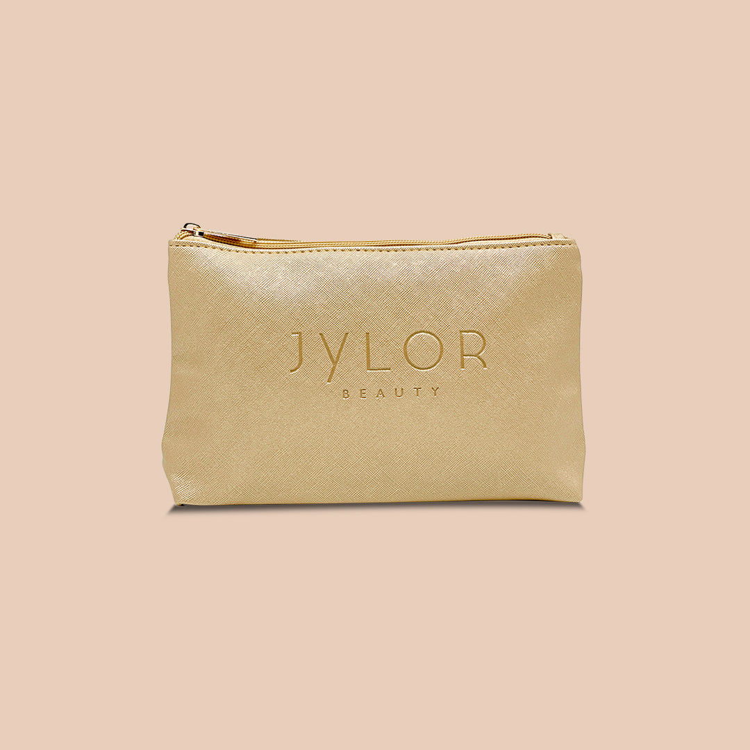 Trousse beauté dorée
